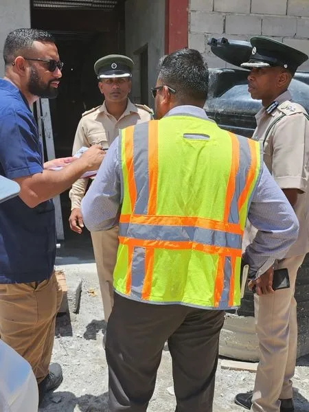 Permanent Secretary and Ministry Team Survey Lusignan Prison Facilities